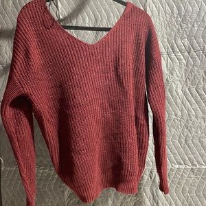 maroon sweater with knot in back